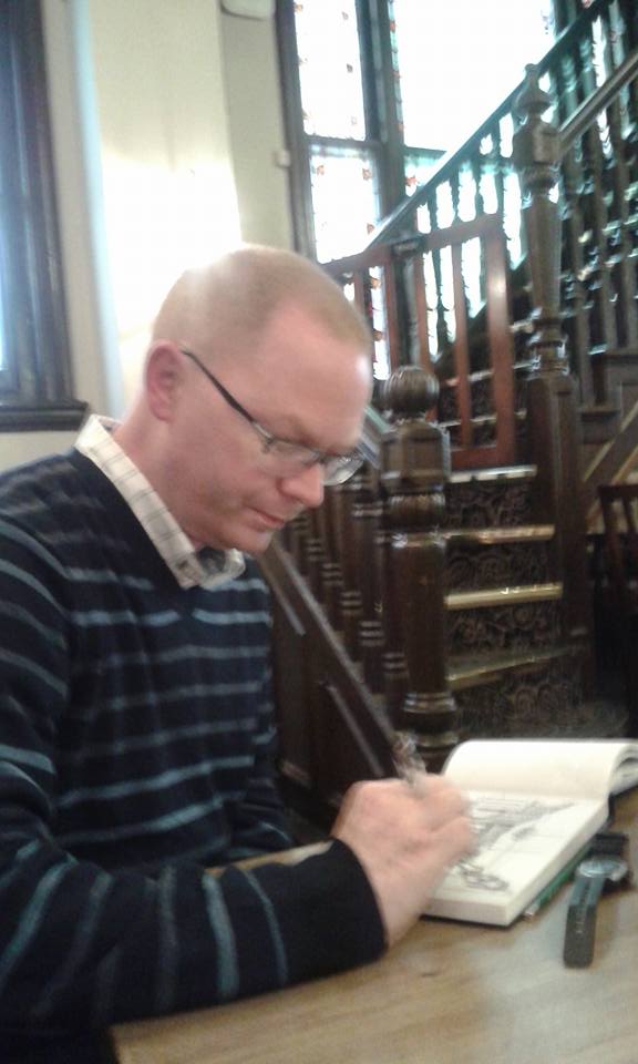 pete sketching in the ship