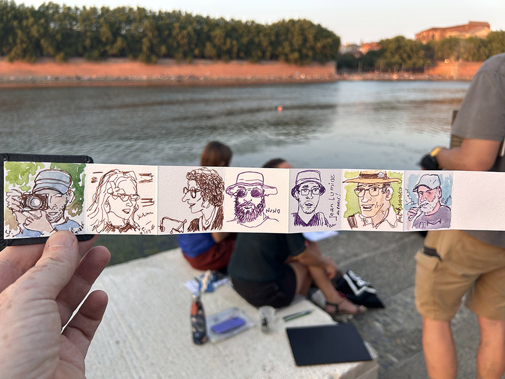 sketch of my micro sketchbook showing various sketches of faces
